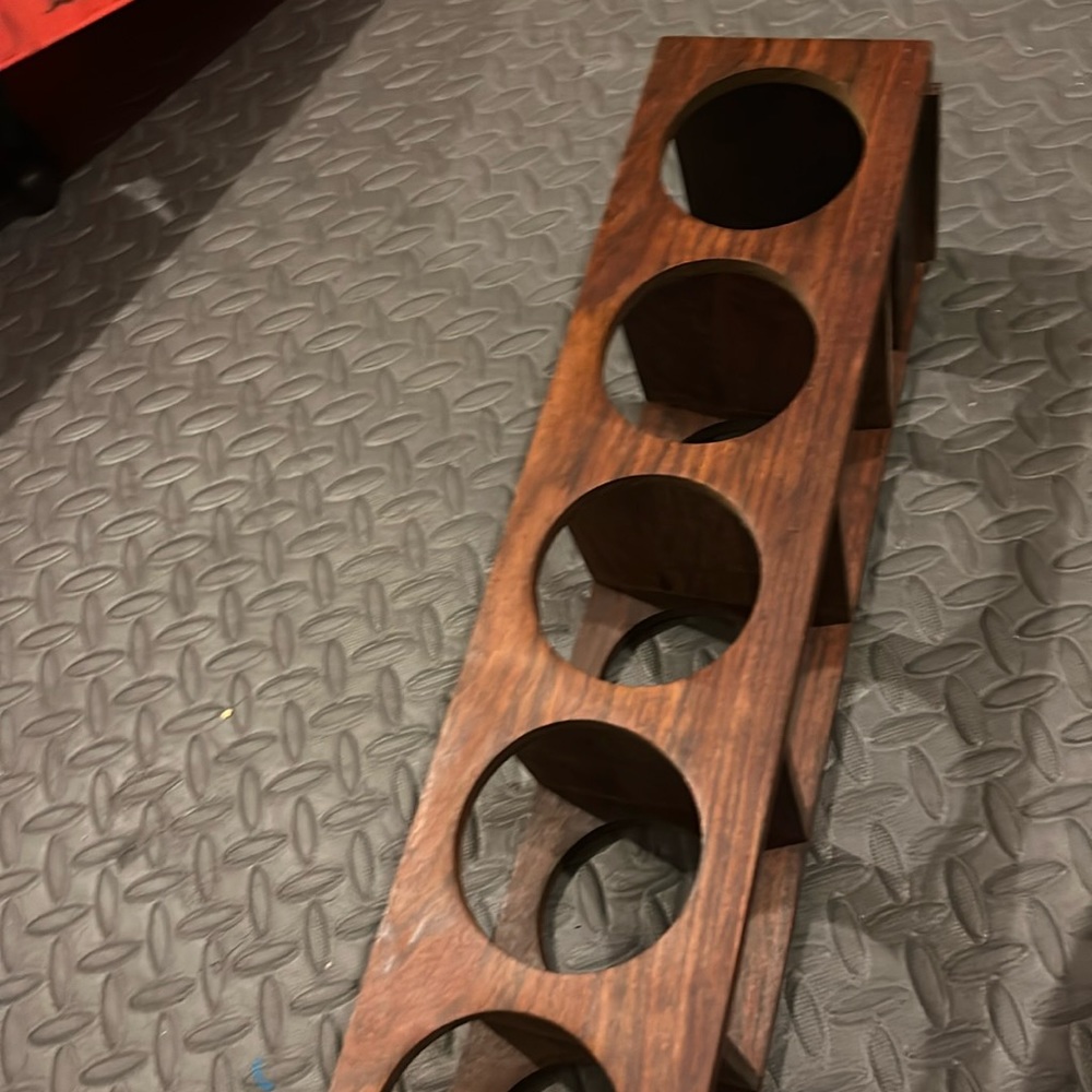 5 bottle holder acaci wood dark brown. Hangs on wall.